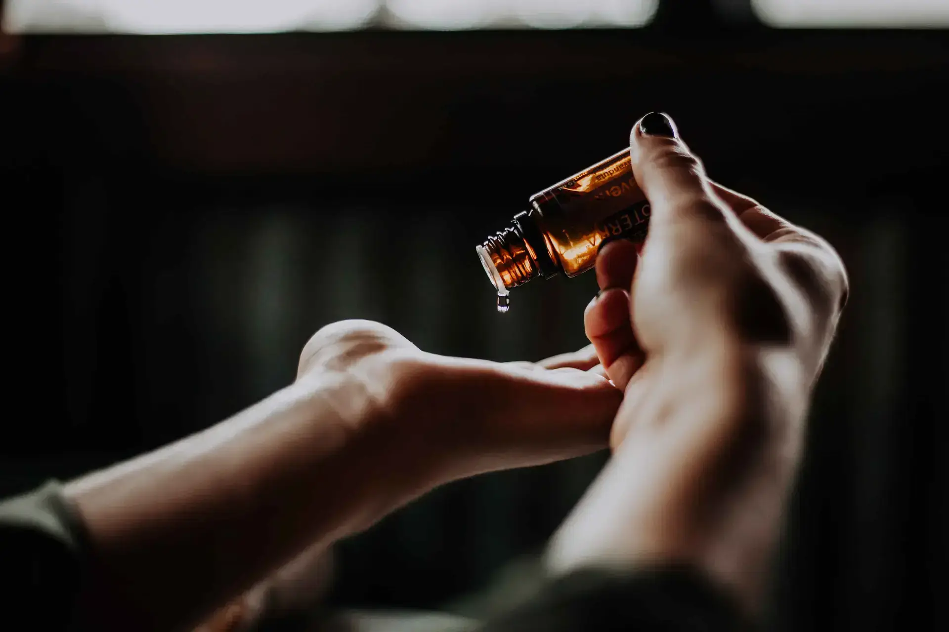 Massage oil being prepared for a treatment