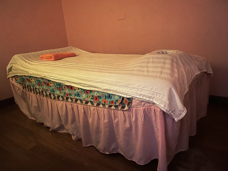 Cozy massage room for personalized therapy sessions
